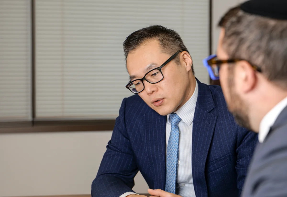 A VC Lawyers lawyer in consultation with a client at the North York office